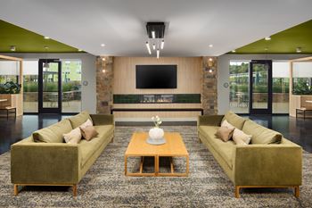 A living room with two couches and a coffee table.